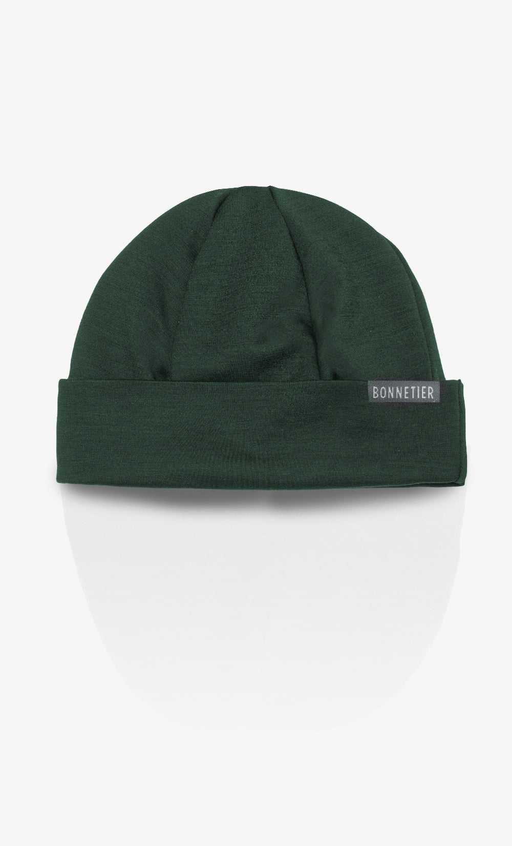 Tuque en laine mérinos brossée vert foncé fabriquée au Canada.